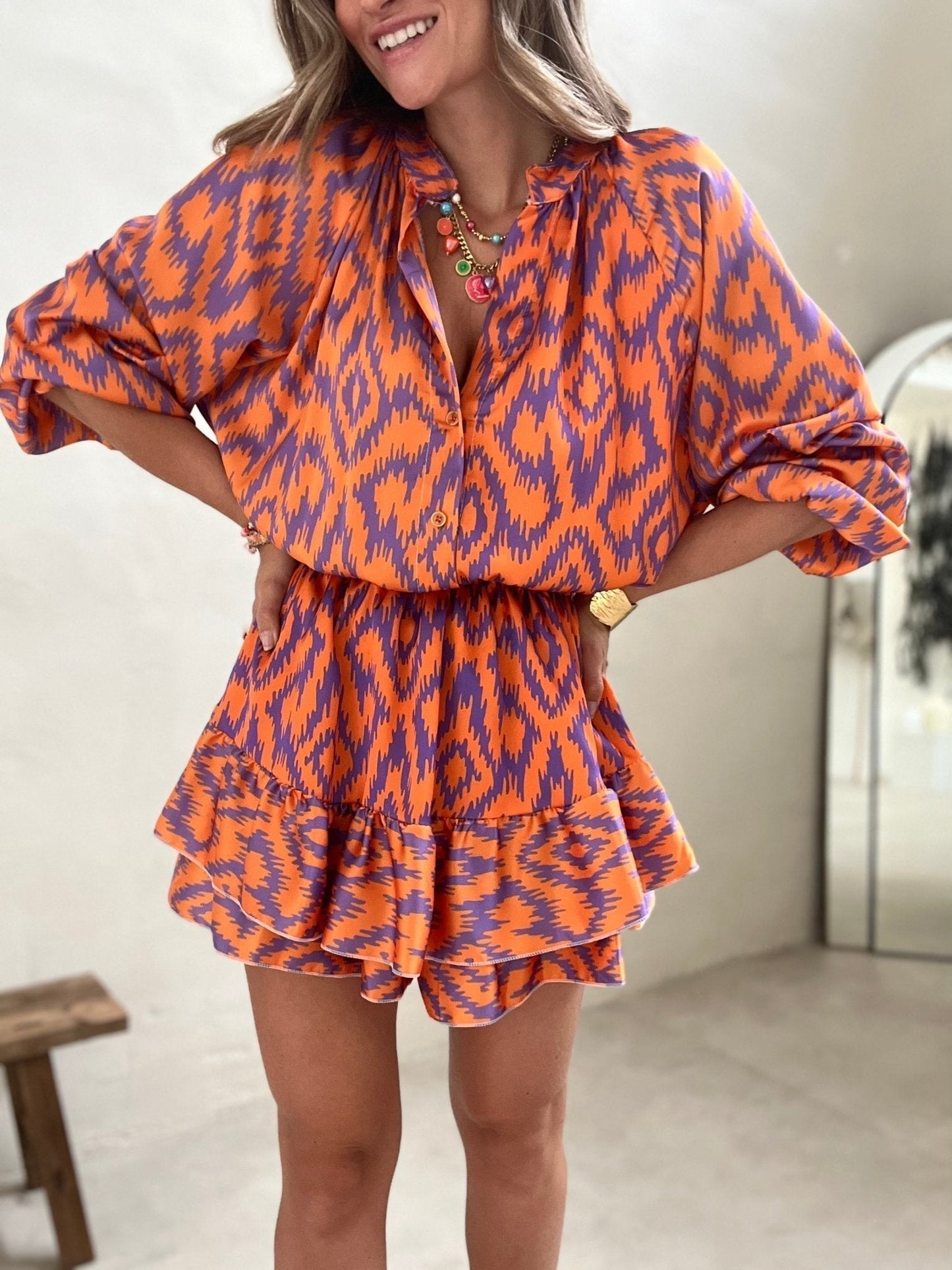 Doreyra Two-Piece Set | Ikat Print Blouse with Ruffled High-Waisted Shorts in Bold Summer Colors