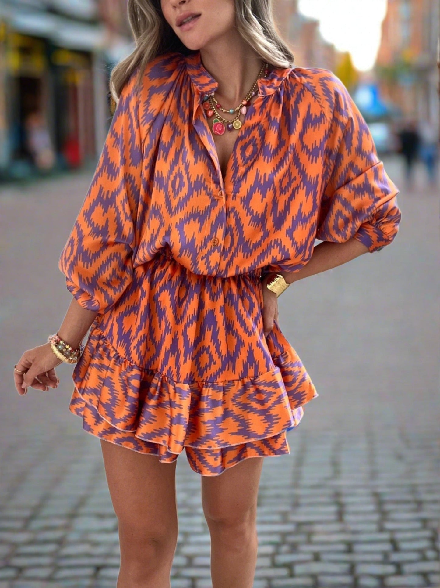 Doreyra Two-Piece Set | Ikat Print Blouse with Ruffled High-Waisted Shorts in Bold Summer Colors